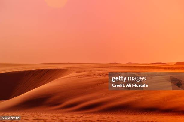 sand sea waves - mostefa stock pictures, royalty-free photos & images