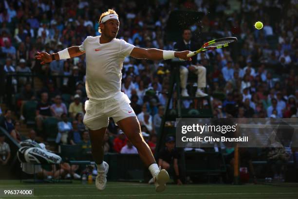 Rafael Nadal of Spain plays a backhand against Juan Martin Del Potro of Argentina during their Men's Singles Quarter-Finals match on day nine of the...