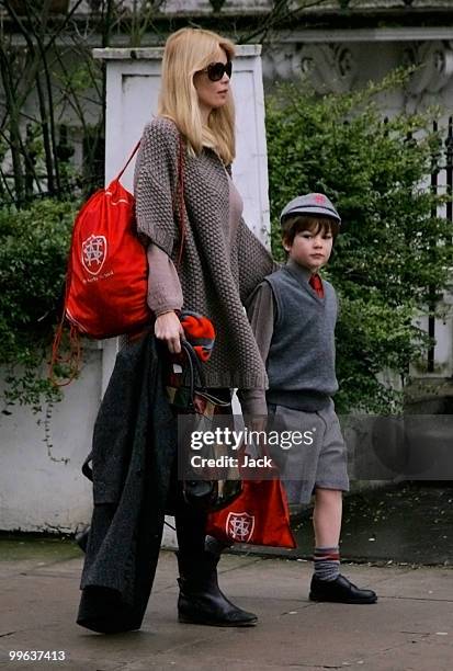 Pregnant Claudia Schiffer on the school run on January 19, 2010 in London, England.