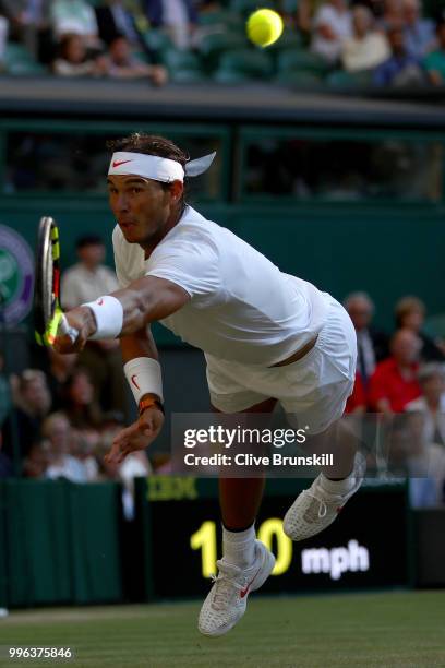 Rafael Nadal of Spain plays a backhand against Juan Martin Del Potro of Argentina during their Men's Singles Quarter-Finals match on day nine of the...