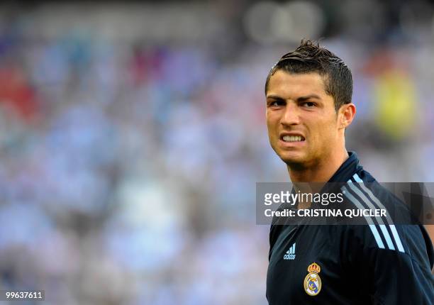Real Madrid's Portuguese forward Cristiano Ronaldo reacts during a football match against Malaga at La Rosaleda's stadium in Malaga, on May 16,...