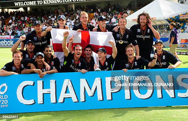 English players celebrate with the trophy as England won the Men's ICC World Twenty20 final match between Australia and England at the Kensington...