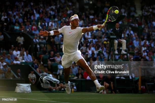 Rafael Nadal of Spain plays a backhand against Juan Martin Del Potro of Argentina during their Men's Singles Quarter-Finals match on day nine of the...