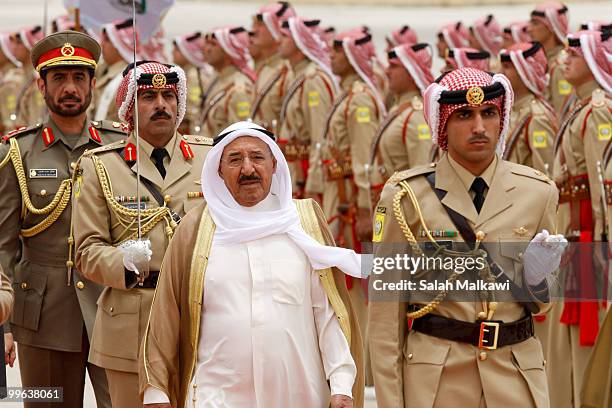 Emir of Kuwait Sheikh Sabah Al-Ahmad Al-Jaber Al-Sabah is welcomed by a military parade as he arrives at Amman airport on May 17, 2010 in Amman,...