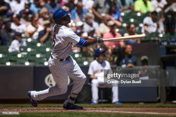 Lorenzo Cain of the Milwaukee Brewers flies out in the first inning against the Atlanta Braves at Miller Park on July 8, 2018 in Milwaukee, Wisconsin.