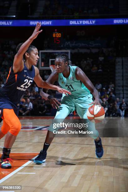 Tina Charles of the New York Liberty handles the ball against the Connecticut Sun on July 11, 2018 at the Mohegan Sun Arena in Uncasville,...