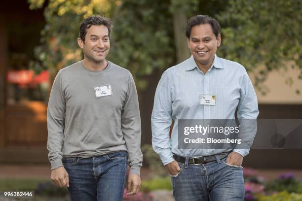 Jon Oringer, chairman and chief executive officer of Shutterstock Inc., and Imran Khan, chief strategy officer of Snap Inc., arrive for a morning...