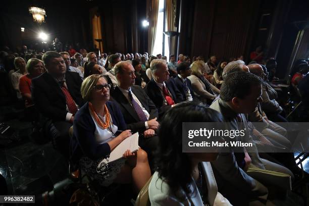 Employees listen to Acting EPA Administrator Andrew Wheeler speak at the Environmental Protection Agency headquarters on July 11, 2018 in Washington,...