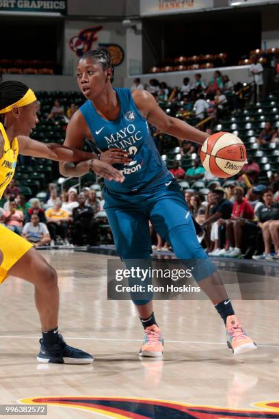 Alexis Jones of the Minnesota Lynx handles the ball against the Indiana Fever on July 11, 2018 at Bankers Life Fieldhouse in Indianapolis, Indiana....