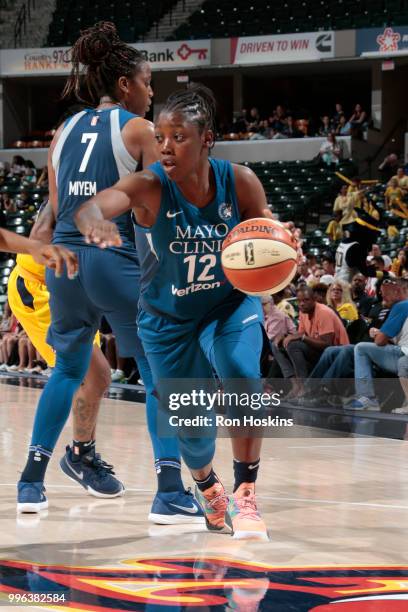 Alexis Jones of the Minnesota Lynx handles the ball against the Indiana Fever on July 11, 2018 at Bankers Life Fieldhouse in Indianapolis, Indiana....