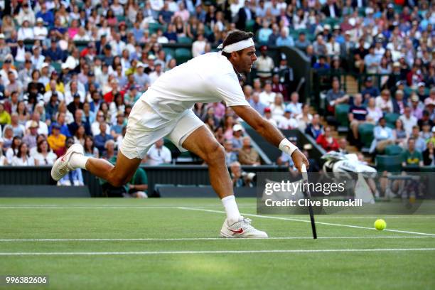 Juan Martin Del Potro of Argentina plays a forehand against Rafael Nadal of Spain during their Men's Singles Quarter-Finals match on day nine of the...