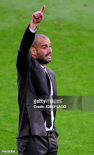 Barcelona's coach Josep Guardiola gestures during Spanish League football match against Valladolid at the Camp Nou Stadium in Barcelona, on May 16,...