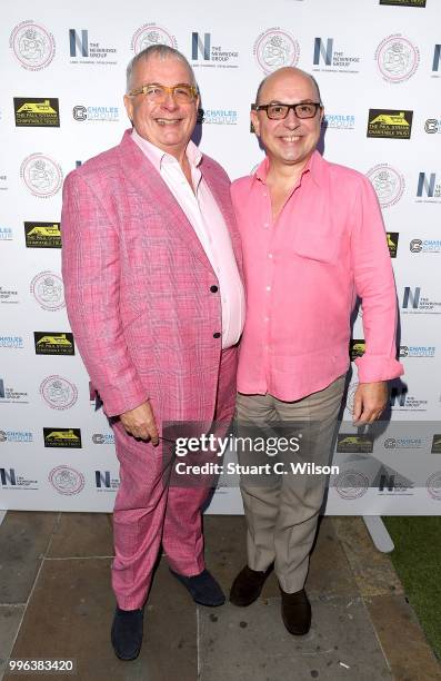 Christopher Biggins and Neil Sinclair attend the Paul Strank Charitable Trust Summer party at Sanctum Soho Hotel on July 11, 2018 in London, England.