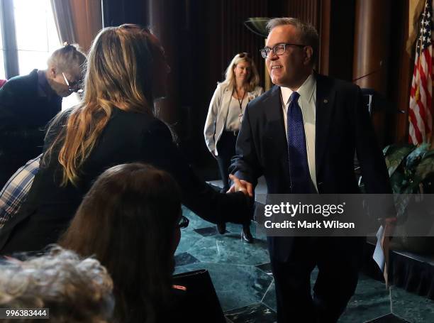 Acting EPA Administrator Andrew Wheeler greets employees at the Environmental Protection Agency headquarters on July 11, 2018 in Washington, DC. If...