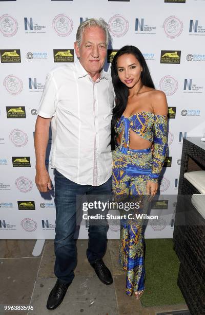 Paul Strank and Natasha Grano attend the Paul Strank Charitable Trust Summer party at Sanctum Soho Hotel on July 11, 2018 in London, England.
