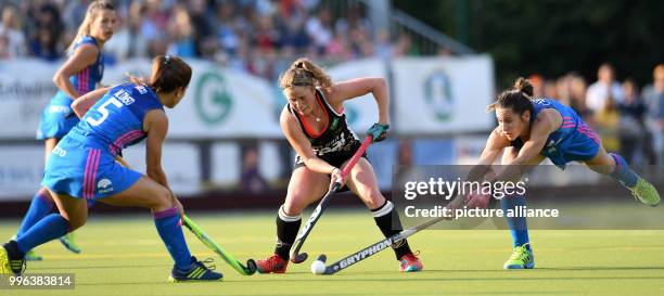 July 2018, Germany, Munich: Hockey, Womens: Four Nations Cup, Germany vs Argentina, 1st matchday: Maike Schaunig of Germany and Agostina Alonso and...