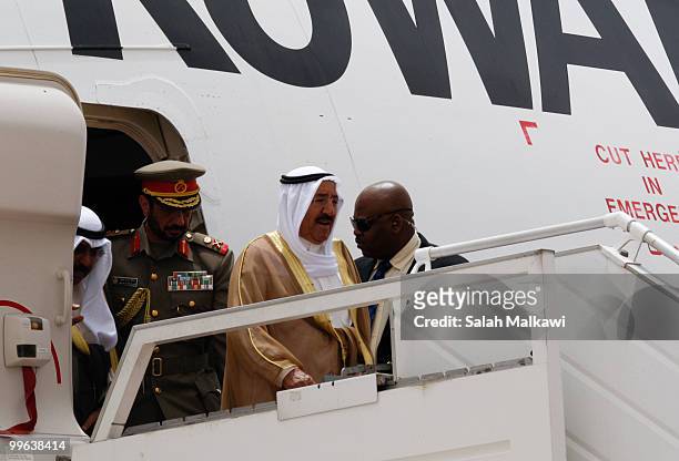 Emir of Kuwait Sheikh Sabah Al-Ahmad Al-Jaber Al-Sabah alights from a plane as he arrives at Amman airport on May 17, 2010 in Amman, Jordan. The...