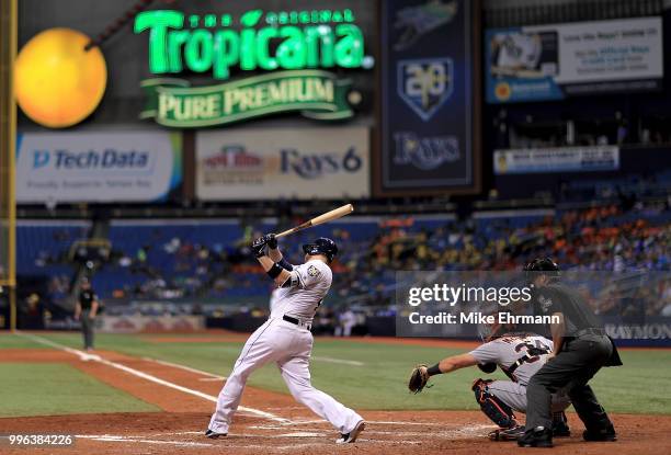 Cron of the Tampa Bay Rays hits a three run home run in the seventh inning during a game against the Detroit Tigers at Tropicana Field on July 11,...