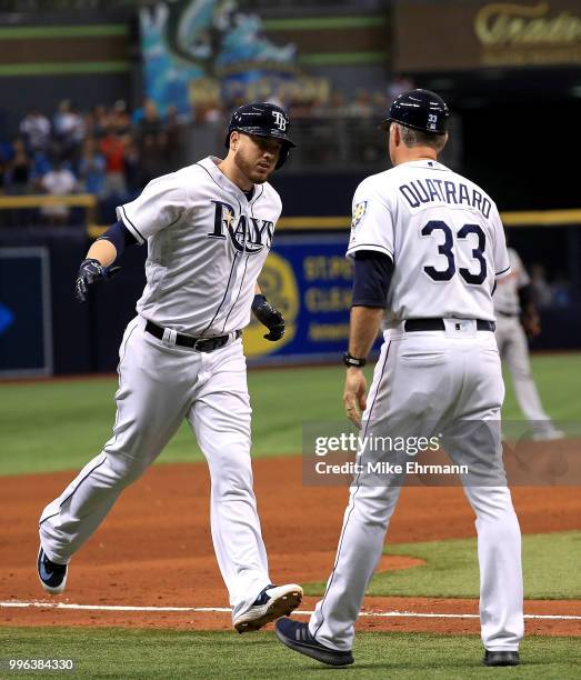 Cron of the Tampa Bay Rays is congratulated after hitting a three run home run in the seventh inning during a game against the Detroit Tigers at...