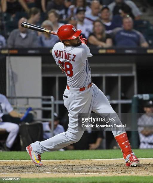Jose Martinez of the St. Louis Cardinals bats against the Chicago White Sox at Guaranteed Rate Field on July 10, 2018 in Chicago, Illinois. The...