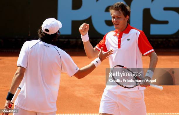 Jeremy Chardy and Nicolas Mahut of France celebrates after winning their double match against Philip Kohlschreiber and Christopher Kas of Germany...