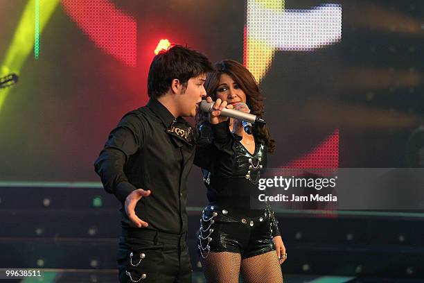 Rodrigo and Mayrene sing during the 8th concert of the reality show Second Chance, of TV Azteca, at Churubusco Studies on Mayn 16, 2010 in Mexico...
