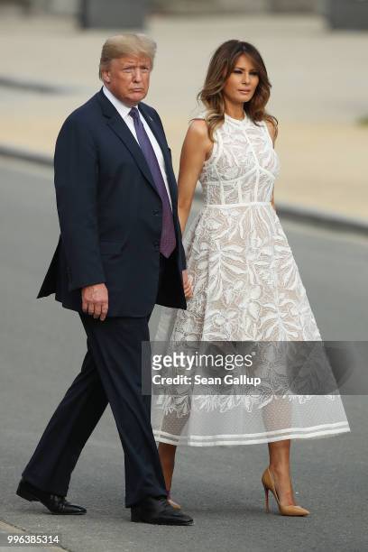 President Donald Trump and U.S. First Lady Melania Trump attend the evening reception and dinner at the 2018 NATO Summit on July 11, 2018 in...