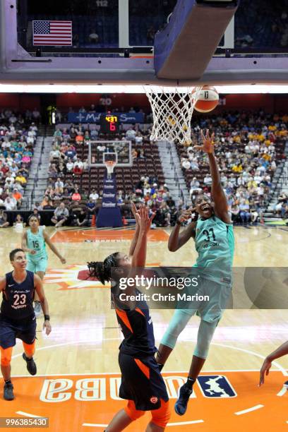 Tina Charles of the New York Liberty shoots the ball against the Connecticut Sun on July 11, 2018 at the Mohegan Sun Arena in Uncasville,...