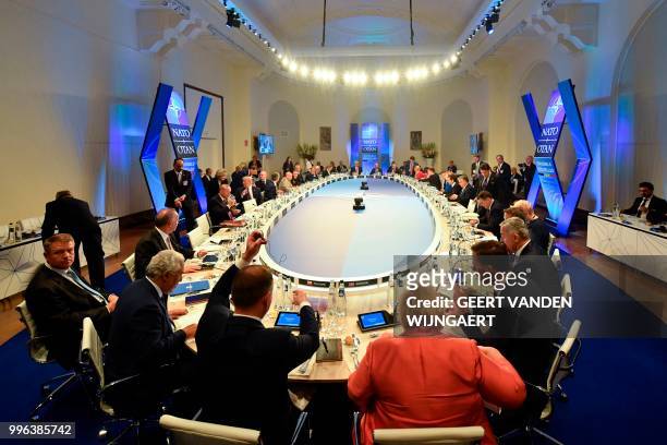 Leaders gather for a working dinner at the Art and History Museum in The Parc du Cinquantenaire - Jubelpark Park in Brussels on July 11 during the...