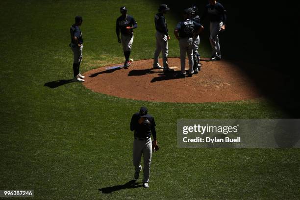 Sean Newcomb of the Atlanta Braves walks off the field after being relieved in the fourth inning against the Milwaukee Brewers at Miller Park on July...