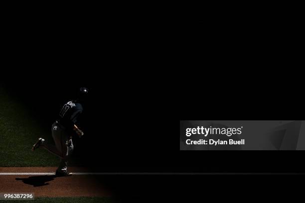 Ender Inciarte of the Atlanta Braves runs to home plate in the fifth inning against the Milwaukee Brewers at Miller Park on July 8, 2018 in...