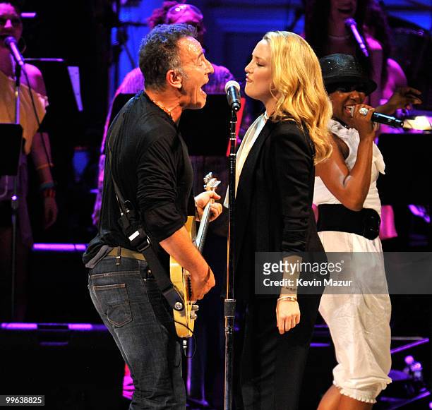 Bruce Springsteen and Kate Hudson perform on stage during the Almay concert to celebrate the Rainforest Fund's 21st birthday at Carnegie Hall on May...