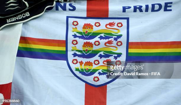 An England flag with gay pride colours is seen during the 2018 FIFA World Cup Russia Semi Final match between England and Croatia at Luzhniki Stadium...