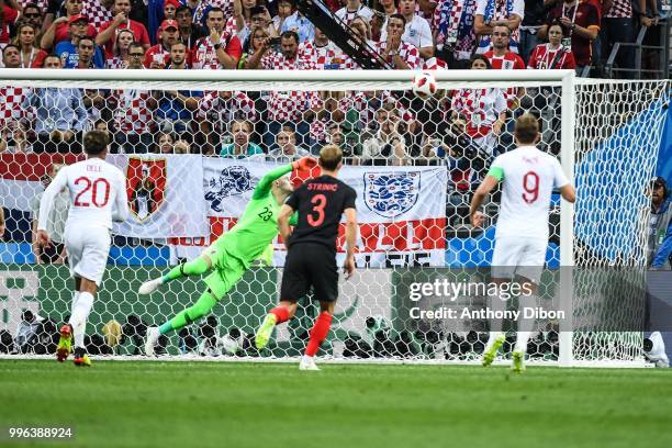 Danijel Subasic of Croatia see the freekick of Kieran Trippier of England crossing the line during the Semi Final FIFA World Cup match between...