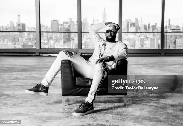 Fashionable 50: Portrait of Green Bay Packers tight end Marcedes Lewis posing during photo shoot at 7 World Trade Center. New York, NY 4/7/2018...