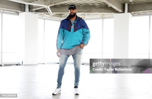 Fashionable 50: Portrait of Green Bay Packers tight end Marcedes Lewis posing during photo shoot at 7 World Trade Center. New York, NY 4/7/2018...
