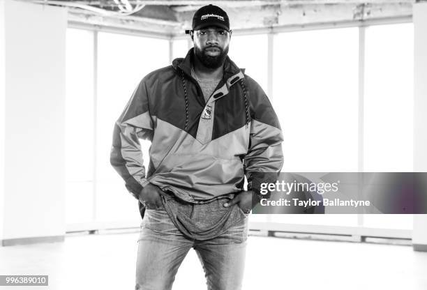 Fashionable 50: Portrait of Green Bay Packers tight end Marcedes Lewis posing during photo shoot at 7 World Trade Center. New York, NY 4/7/2018...