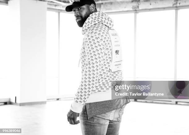 Fashionable 50: Portrait of Green Bay Packers tight end Marcedes Lewis posing during photo shoot at 7 World Trade Center. New York, NY 4/7/2018...