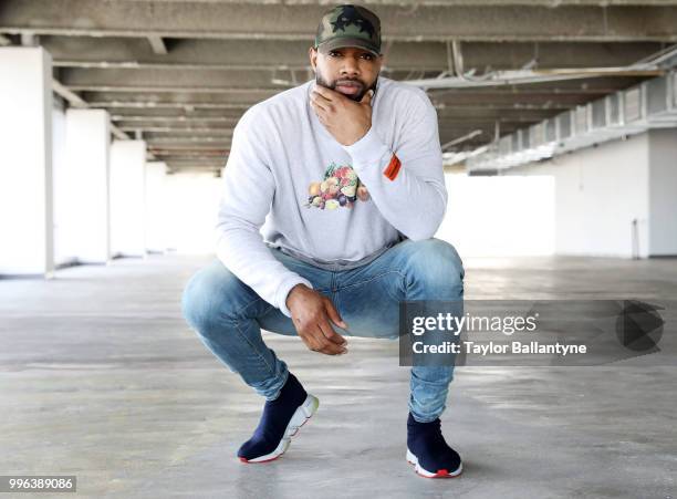 Fashionable 50: Portrait of Green Bay Packers tight end Marcedes Lewis posing during photo shoot at 7 World Trade Center. New York, NY 4/7/2018...