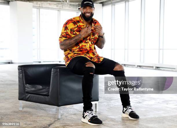 Fashionable 50: Portrait of Green Bay Packers tight end Marcedes Lewis posing during photo shoot at 7 World Trade Center. New York, NY 4/7/2018...