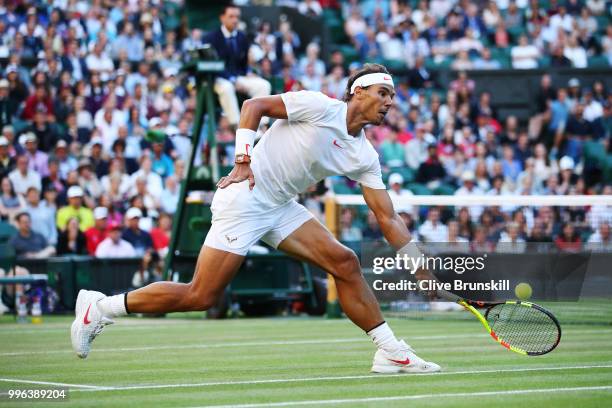 Rafael Nadal of Spain plays a backhand against Juan Martin Del Potro of Argentina during their Men's Singles Quarter-Finals match on day nine of the...