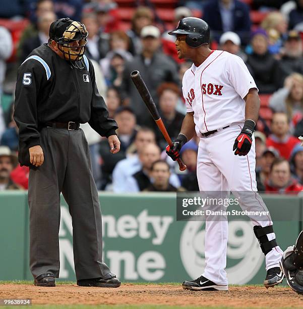 Adrian Beltre of the Boston Red Sox disputes a call with Home Plate umpire Dale Scott during the game between the Toronto Blue Jays and the Boston...