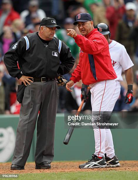 Manager Terry Francona of the Boston Red Sox argues a strike call with Home Plate umpire Dale Scott during the game between the Toronto Blue Jays and...