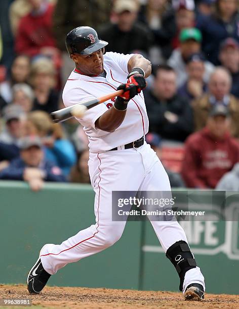 Adrian Beltre of the Boston Red Sox belts an RBI single in the 9th inning during the game between the Toronto Blue Jays and the Boston Red Sox on...