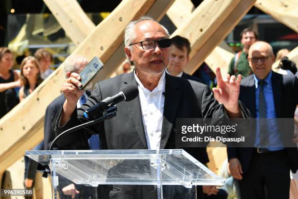 Artist Mel Chin speaks during the unveiling of his large-scale sculpture "Wake" and companion mixed reality piece "Unmoored" in Times Square on July...