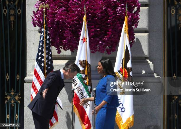 California Lt. Gov. Gavin Newsom bows in front of San Francisco mayor London Breed after she was sworn in during her inauguration at San Francisco...