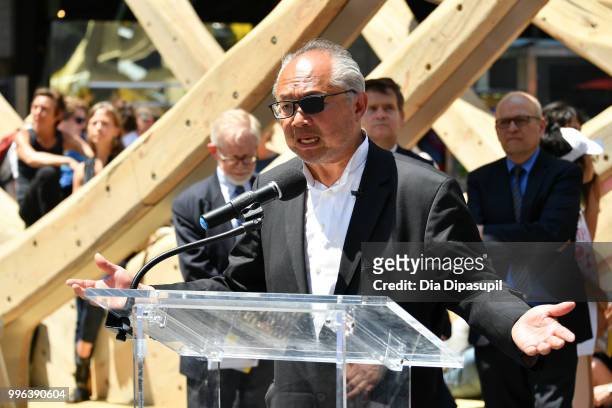 Artist Mel Chin speaks during the unveiling of his large-scale sculpture "Wake" and companion mixed reality piece "Unmoored" in Times Square on July...