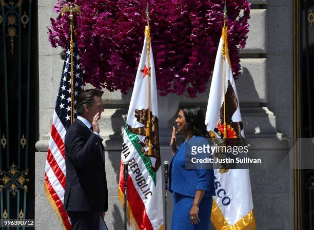 California Lt. Gov. Gavin Newsom administers the oath of office to San Francisco mayor London Breed during her inauguration at San Francisco City...