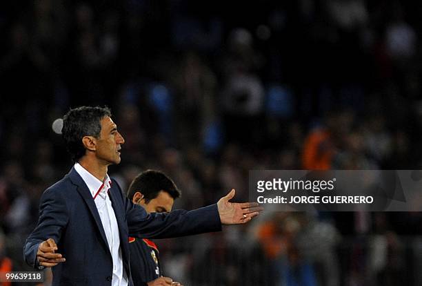 Sevilla's coach Antonio Alvarez gestures during a Spanish league football match against Almeria at Juegos del Mediterraneo stadium in Almeria on May...