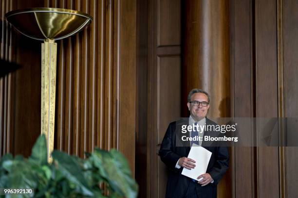 Andrew Wheeler, acting administrator of the Environmental Protection Agency , waits to speak to employees at the agency's headquarters in Washington,...